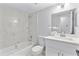Modern bathroom with white vanity and bathtub at 4403 Brooke St, Orlando, FL 32811
