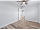 Well-lit bedroom with wood floors and access to another room at 4403 Brooke St, Orlando, FL 32811