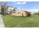 Exterior view of single story home with lawn at 4403 Brooke St, Orlando, FL 32811
