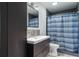 Bathroom with updated vanity and shower at 5437 Lake Margaret Dr # C, Orlando, FL 32812