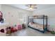 bedroom with bunk bed, toys, and plenty of natural light at 5437 Lake Margaret Dr # C, Orlando, FL 32812