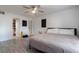 Main bedroom with king-size bed and access to closet at 5437 Lake Margaret Dr # C, Orlando, FL 32812