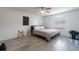Guest bedroom with full-size bed and ceiling fan at 5437 Lake Margaret Dr # C, Orlando, FL 32812