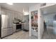 Modern kitchen with stainless steel appliances and ample cabinet space at 5437 Lake Margaret Dr # C, Orlando, FL 32812