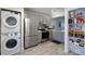 Modern kitchen with stainless steel appliances and built-in pantry at 5437 Lake Margaret Dr # C, Orlando, FL 32812