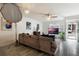 Spacious living room with large TV and sliding glass doors leading to exterior at 5437 Lake Margaret Dr # C, Orlando, FL 32812