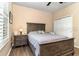 Bright bedroom with double bed, nightstand and large closet at 672 Cordoba Dr, Davenport, FL 33837