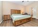 Main bedroom with ensuite bathroom and large bed at 672 Cordoba Dr, Davenport, FL 33837
