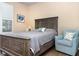 Guest bedroom with a queen bed and window seating at 672 Cordoba Dr, Davenport, FL 33837