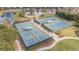 Two community tennis courts at 672 Cordoba Dr, Davenport, FL 33837