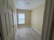 Simple bedroom with tile floors and neutral walls at 7112 Bledsoe Ave, Orlando, FL 32810