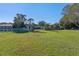 Large backyard with grassy area and privacy fence at 762 S Edgemon Ave, Winter Springs, FL 32708
