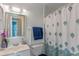 Clean bathroom with shower/tub combo and updated vanity at 762 S Edgemon Ave, Winter Springs, FL 32708