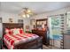 Bedroom with a red and white checkered comforter at 762 S Edgemon Ave, Winter Springs, FL 32708