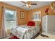 Cozy bedroom with a queen bed and decorative accents at 762 S Edgemon Ave, Winter Springs, FL 32708