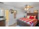 Bedroom with a red and white checkered comforter at 762 S Edgemon Ave, Winter Springs, FL 32708