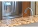 Kitchen boasts granite countertops and stainless steel appliances at 762 S Edgemon Ave, Winter Springs, FL 32708