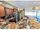 Modern kitchen with granite countertops and stainless steel appliances at 762 S Edgemon Ave, Winter Springs, FL 32708