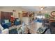 Open living area with a kitchen island and a view to screened patio at 762 S Edgemon Ave, Winter Springs, FL 32708