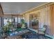 Relaxing screened porch with comfy seating and outdoor rug at 762 S Edgemon Ave, Winter Springs, FL 32708