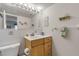 Clean bathroom with light wood vanity and shower at 815 Ocean Shore Blvd # U9A, Ormond Beach, FL 32176