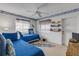 Bedroom with twin beds, ceiling fan and ocean decor at 815 Ocean Shore Blvd # U9A, Ormond Beach, FL 32176