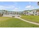 Community features a pool, lush landscaping, and courtyard at 815 Ocean Shore Blvd # U9A, Ormond Beach, FL 32176