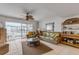 Relaxing living room with ocean view and wicker furniture at 815 Ocean Shore Blvd # U9A, Ormond Beach, FL 32176