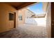 Private outdoor patio with brick pavers and access door, perfect for entertaining and relaxing at 9025 Savannah Julip Ln, Orlando, FL 32832