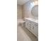 Renovated bathroom, featuring a bathtub shower combo and modern vanity at 940 Village Trl # 8-101, Port Orange, FL 32127