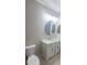 Modern bathroom with a new vanity and updated fixtures at 940 Village Trl # 8-101, Port Orange, FL 32127