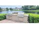 Enjoy outdoor cooking at the community grills overlooking a lake at 940 Village Trl # 8-101, Port Orange, FL 32127