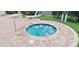 Relax in this community hot tub, easily accessible from the pool at 940 Village Trl # 8-101, Port Orange, FL 32127
