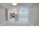 Open floor plan with modern kitchen and living room area at 940 Village Trl # 8-101, Port Orange, FL 32127