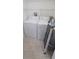 Convenient laundry room with washer and dryer included at 940 Village Trl # 8-101, Port Orange, FL 32127