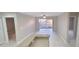 Open concept living area with kitchen and tile floors at 940 Village Trl # 8-101, Port Orange, FL 32127