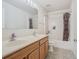 Bathroom with double vanity and shower/tub combo at 1059 Ronlin St, Haines City, FL 33844