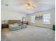 Bright bedroom featuring a ceiling fan and ample space at 1059 Ronlin St, Haines City, FL 33844