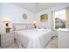 Spacious bedroom with king-size bed and calming decor at 1065 Park Ridge Cir, Kissimmee, FL 34746