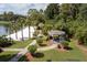 Community gazebo with benches near a lake and sandy beach at 1065 Park Ridge Cir, Kissimmee, FL 34746