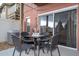Cozy patio with table and chairs, perfect for outdoor dining at 1065 Park Ridge Cir, Kissimmee, FL 34746