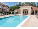 Inviting pool and spa area with lounge chairs at 1065 Park Ridge Cir, Kissimmee, FL 34746
