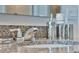 Close up of bathroom sink and granite countertop at 1185 Alstonia Ln, Mount Dora, FL 32757