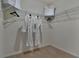 Walk-in closet with wire shelving and hanging rods at 1269 Limbali St, Mount Dora, FL 32757