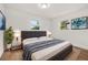 Comfortable bedroom with a king-size bed and decor at 128 Academy Ave, Sanford, FL 32771