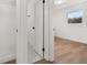 Spacious bedroom with access to bathroom and closet at 128 Academy Ave, Sanford, FL 32771