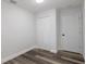 Spacious bedroom with wood-look floors and generous closet space at 1326 S Summerlin Ave, Sanford, FL 32771