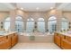 Large Primary bathroom featuring a soaking tub and double sinks at 14762 Braddock Oak Dr, Orlando, FL 32837