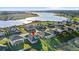 Aerial view of house near lake in a residential area at 16719 Sanctuary Dr, Winter Garden, FL 34787