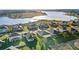 Aerial view of lakefront community with houses at 16719 Sanctuary Dr, Winter Garden, FL 34787